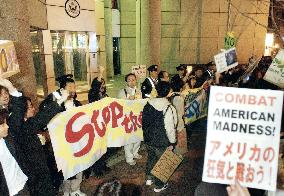 Protesters shout antiwar slogans outside U.S. Conslutate